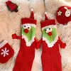 Christmas hat with hand-holding stocking