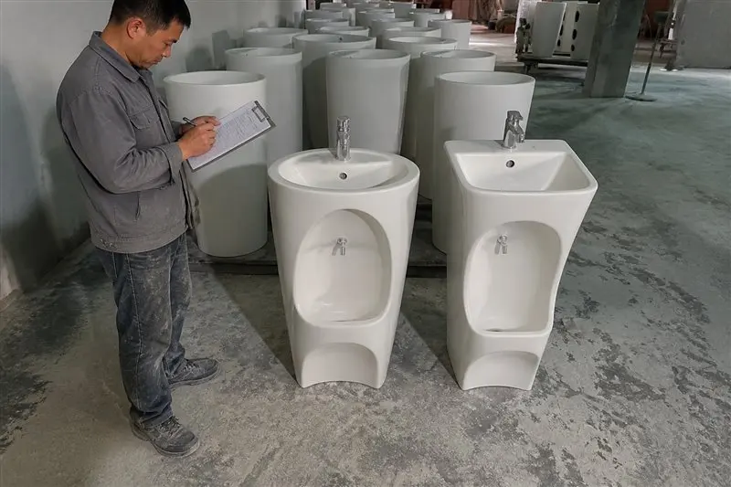 info-1-1 Auditor walking through a ceramic wudu basin production line