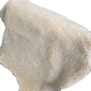 Real high density natural curly sheepskin clothing with sheepskin lining