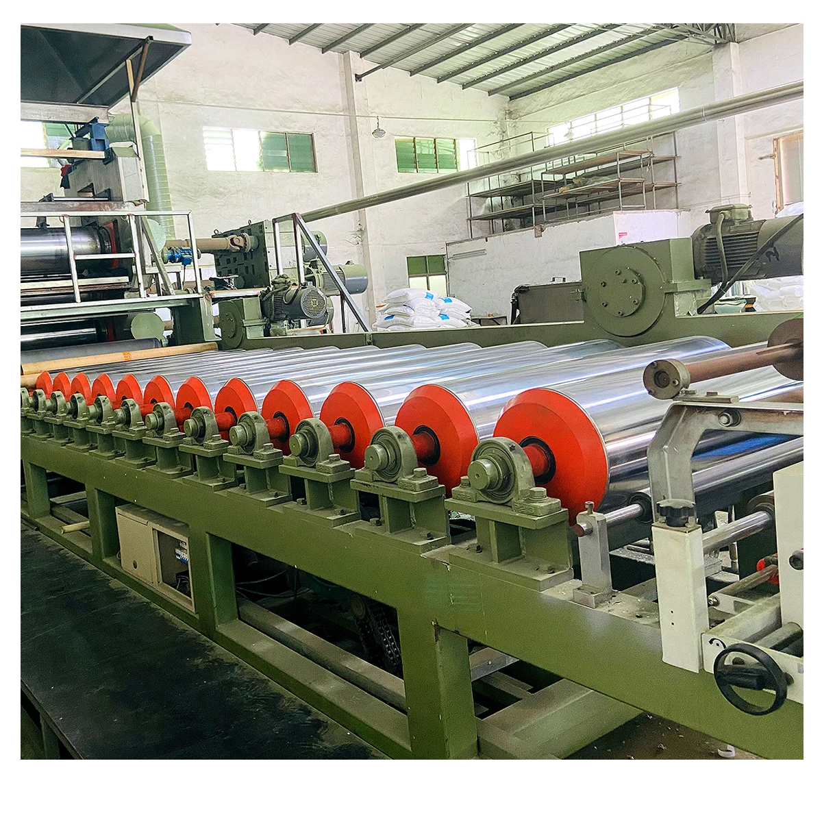 410*1350 PVC Rigid Rolls Film Making Machine With Extrusion Calendering Mixing Whole Production Line