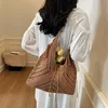 Khaki cotton thread tassel large V-shaped bag