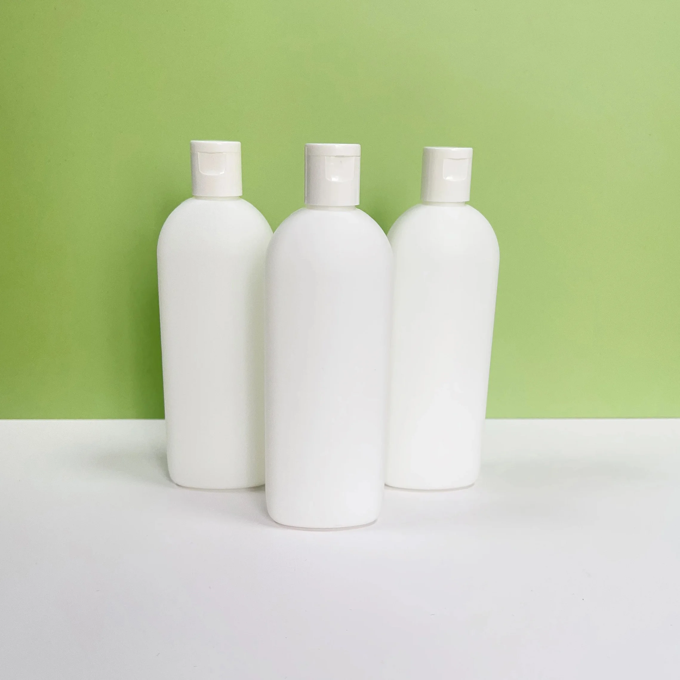 New Product 200ml HDPE Material Lotion Conditioner Body Milk Round Shoulder Flat Bottle