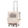 Zaino a doppia spalla beige, edizione Flagship, con maniglia per il trasporto.