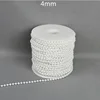 Un mètre de perles en fil de coton 4 mm (blanc cassé)
