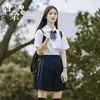 Chemise femme manches courtes + jupe élastique bleu marine + noeud papillon