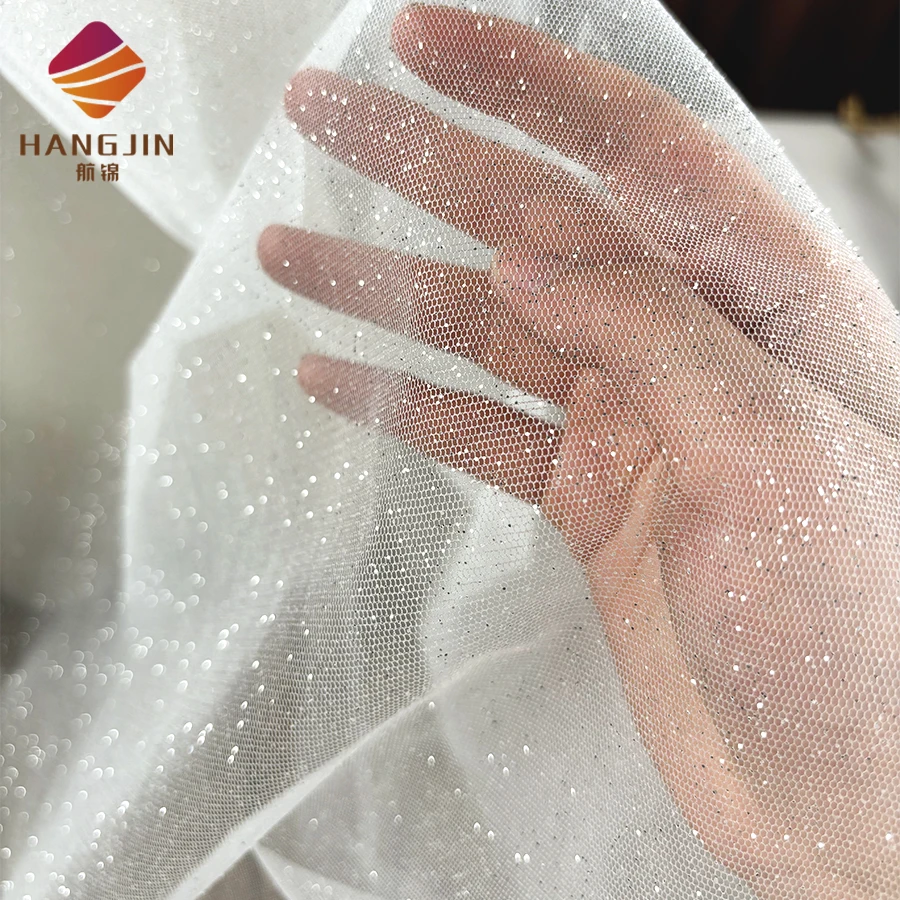 Luxury Shining Silver Sequins Powder Spraying Glued Glitter White Tulle Fabric Lace Ivory Shimmer Mesh Fabric for Wedding Dress Luxury Shining Silver Sequins Powder Spraying Glued Glitter White Tulle Fabric Lace Ivory Shimmer Mesh Fabric for Wedding Dress