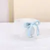 Light blue bow mug