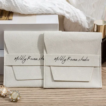 Custom Luxury Microfiber Suede Flap Jewelry Pouch Bag with Embossed Logo Custom Display Packaging for Textile Jewelry