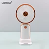 white handheld lash fan