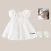 White mesh slip dress + lace hat + princess socks