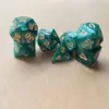 Pearl pattern green dot gold lettering