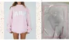 Pink, white letters with gray edge