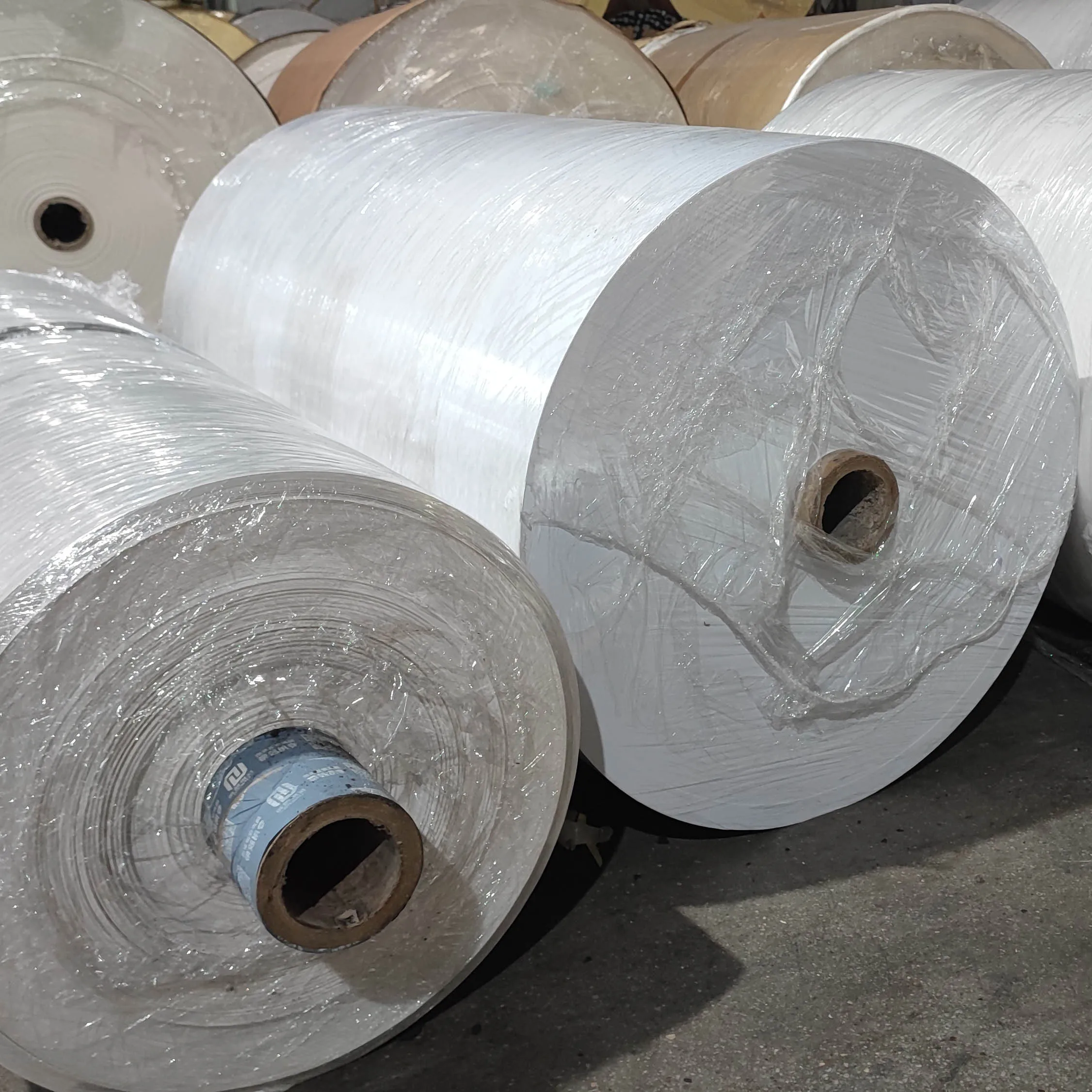 Factory Wholesale Jumbo Roll Thermal Printing Material for Waybill Industrial Label Sticker factory