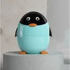 Blue penguin trash can