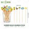 Piques de bambou de plage d'été