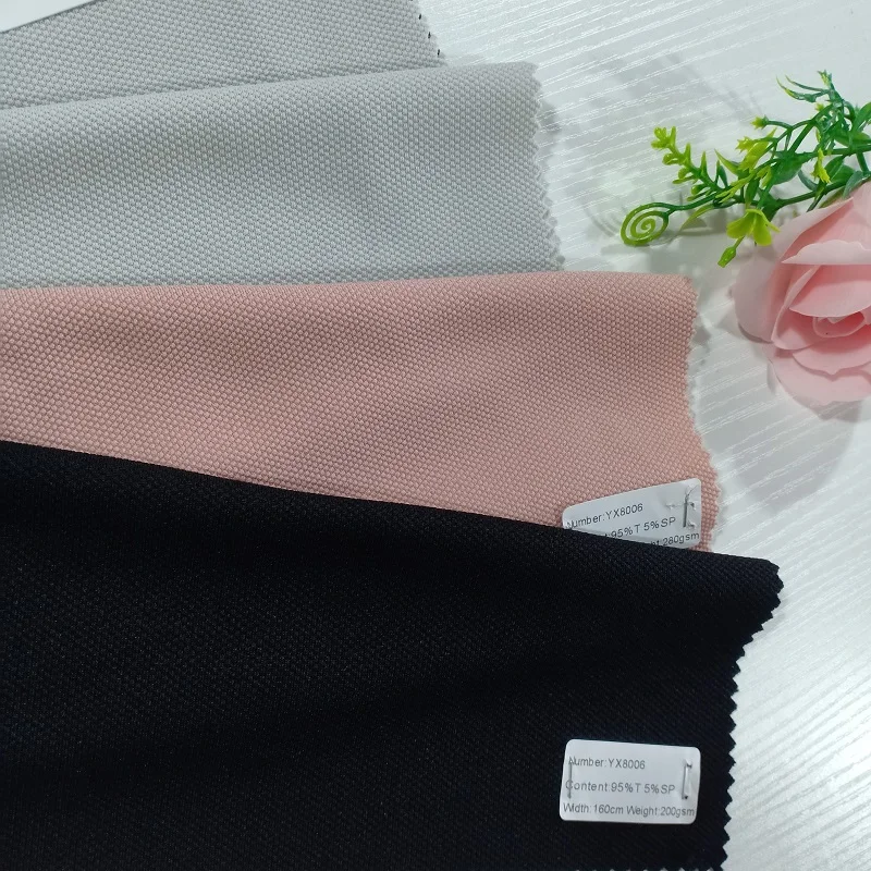 
 Дешевые трикотажные ткани из смеси спандекса и полиэстера жаккарда кукурузы для платья или домашнего текстиля  