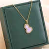 Gold  necklace-floral purple