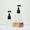 Frosted bottle with black dropper head