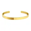 Brazalete de acero inoxidable chapado en oro