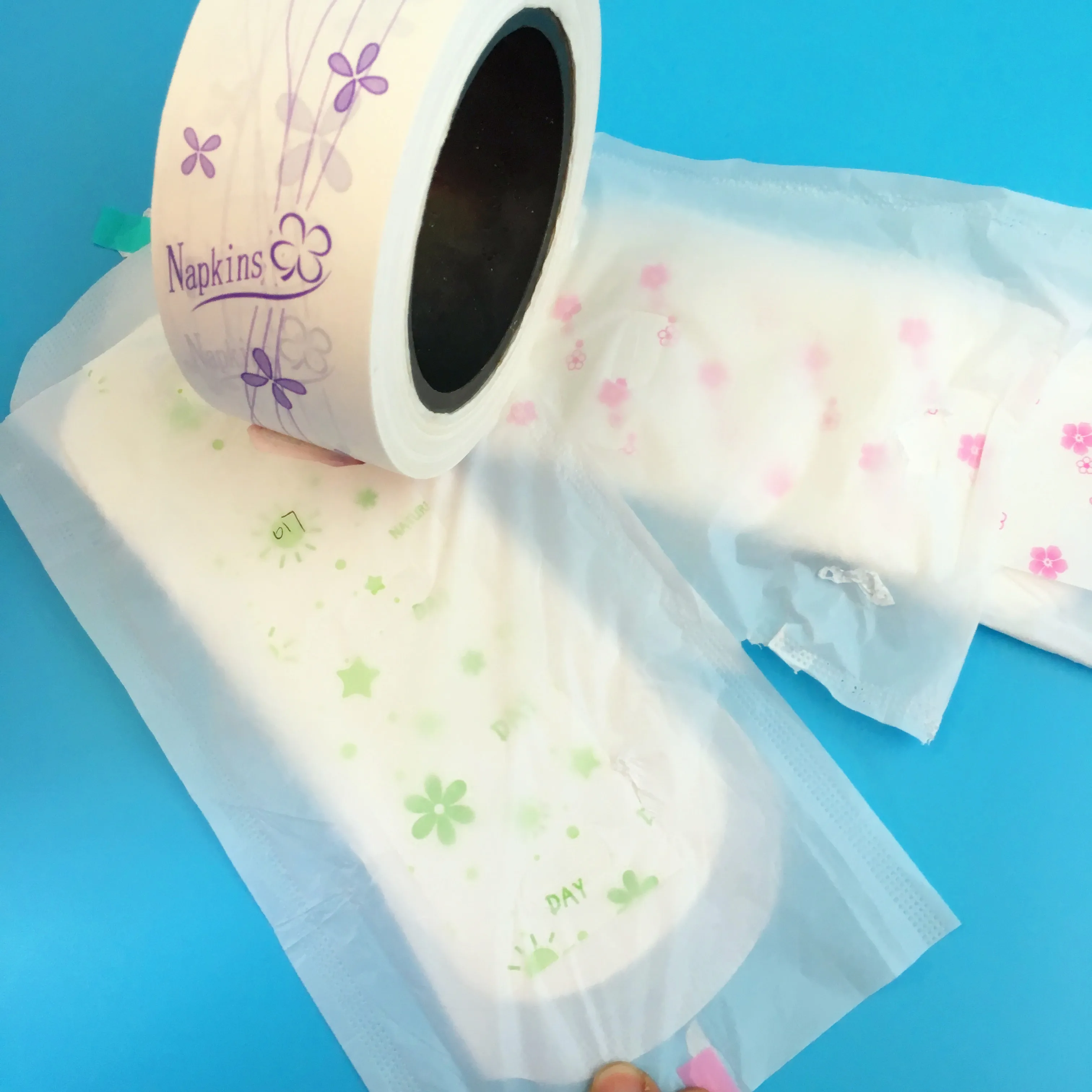 In Bulk Jumbo Roll Release Paper for Sanitary Towel Making Sanitary Pad Raw Material