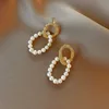 18 pendientes de perlas C6020