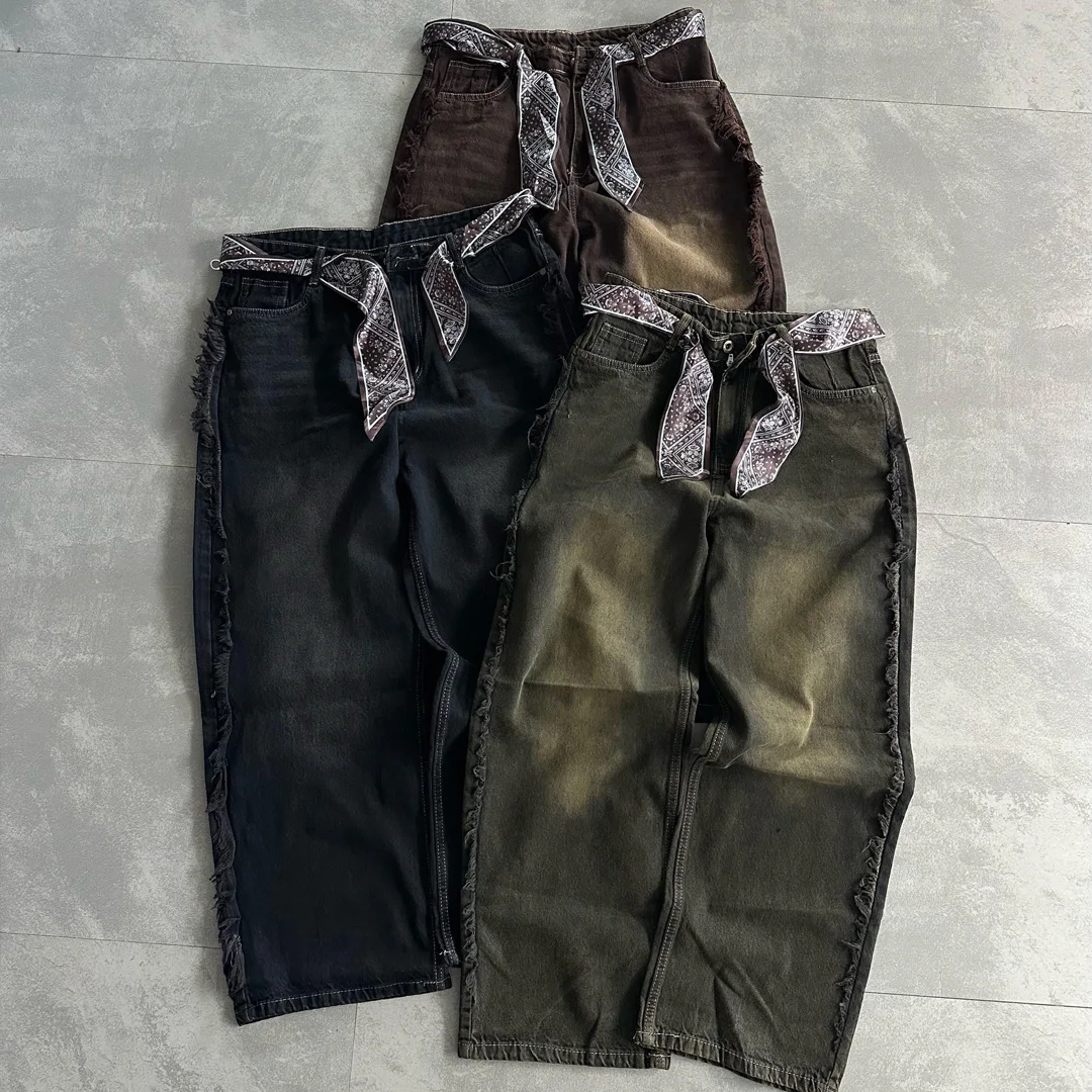 Návrhové zákaznické vintage džíny s vybledlým a poškozeným povrchem, surovými bočními švy a látkovým páskem, streetwearové džíny s širokými nohavicemi pro muže