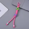 Pink letter braided cord