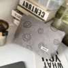 Grey smiley bag