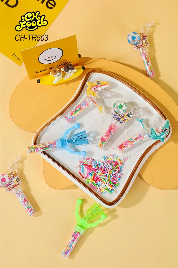 Low MOQ Small Plastic Dolphin and Football Whistle Shaking Needle Toys with Colorful Candy for Kids