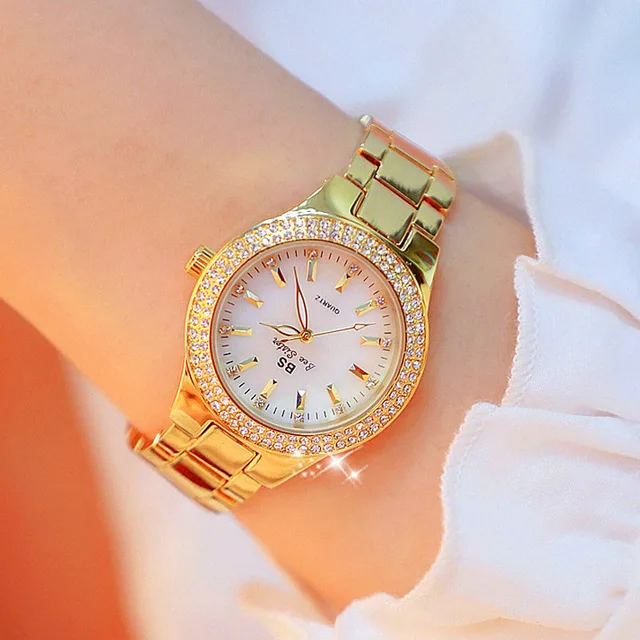 Ladies golden deals wrist watch