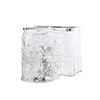 A toothbrush holder, transparent white