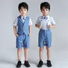 21129 gilet+camicia+pantaloncini+fiocco+bretelle