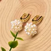 GE0810-18 Orecchini con perle, fiori e zirconi