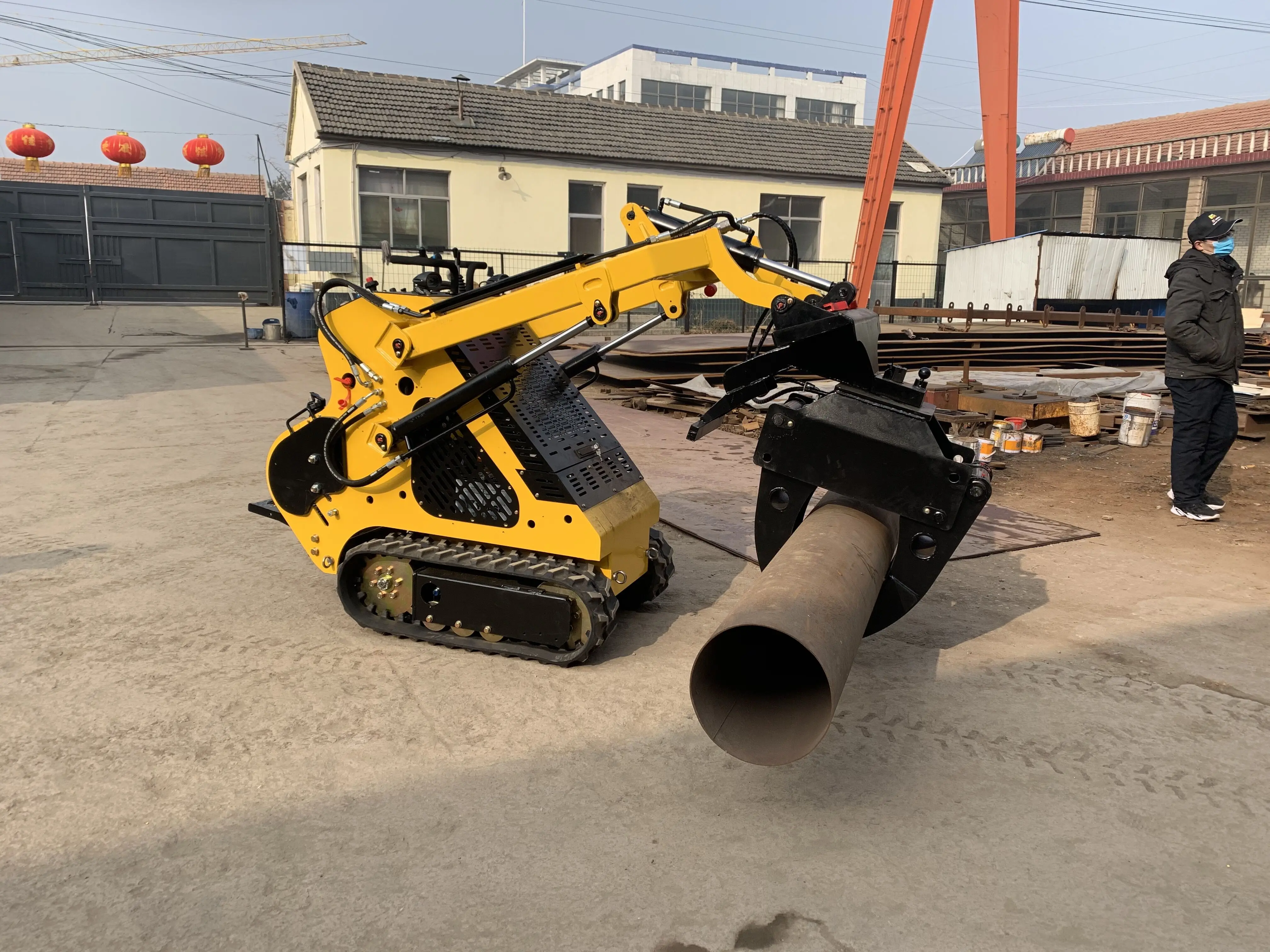 Log and Wood Loading and Unloading Rotating Positioned Log Grapple Skid Steer Loader