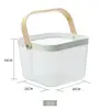 Petit panier à main en fer blanc