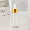 Botellas cuentagotas de vidrio transparente + anillo de oro + caucho blanco