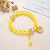 Braccialetto piccolo con margherite - giallo scuro