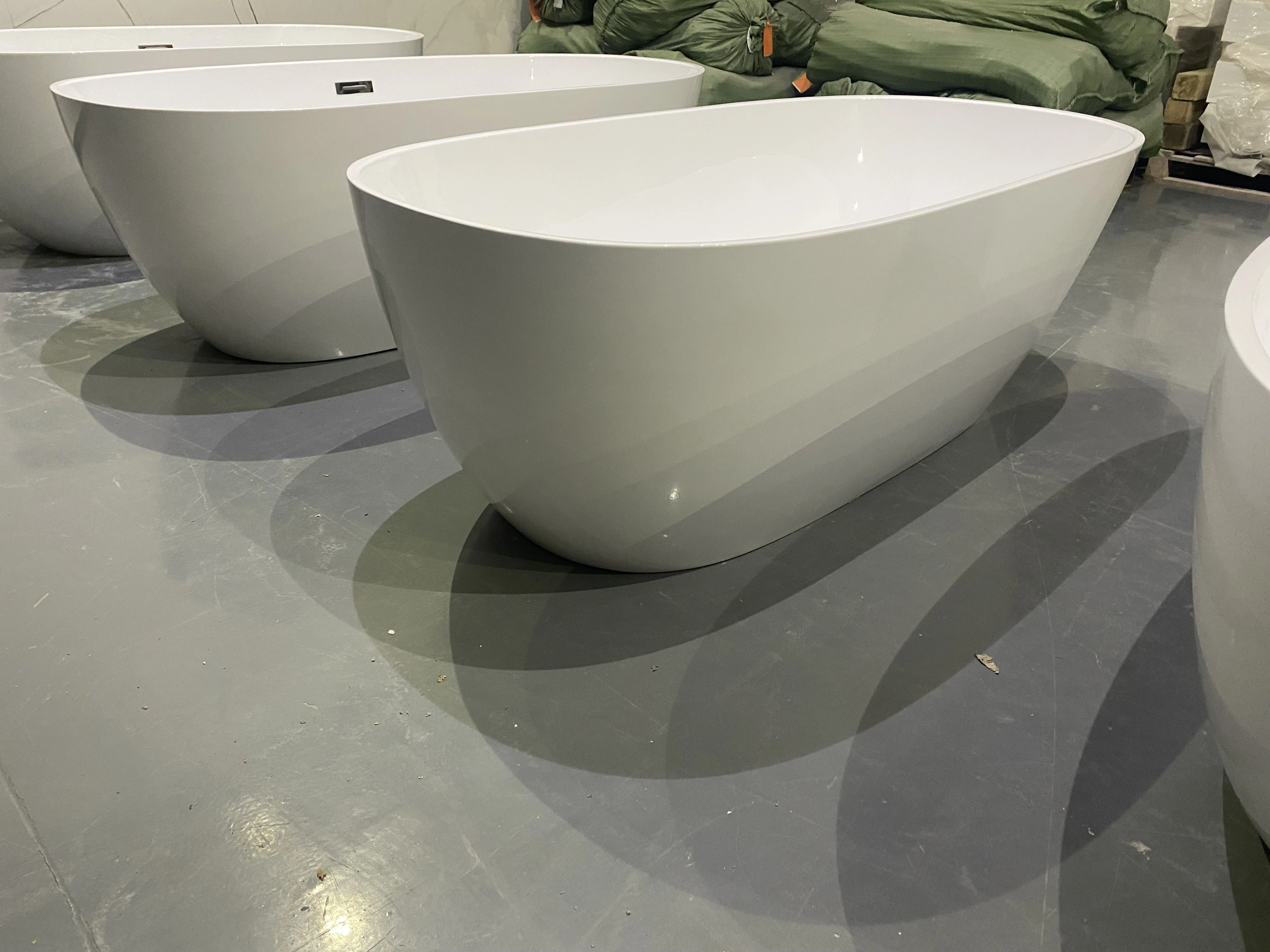 Promotion Competitive Price Direct Free Stand Tap Egg Shape Artificial Stone Tub Solid Surface Oval Bathtub Shape Tub for Sale