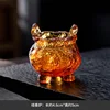 Amber-colored glass incense burner