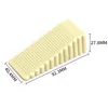 Large beige triangular door stop