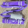 Individually packaged (two-tone purple) figure-eight resistance band