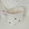 Beige embroidery