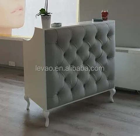 tufted salon reception desk