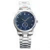 Cadran bleu, lunette argentée, bracelet en acier argenté 7
