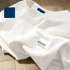 Distintivo Cm-petto pieno di energia bianco