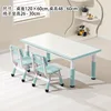 Whiteboard, whale blue color scheme, table, two chairs