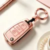 Étui à clés modèle D en grain de bois or rose-rose, boucle pratique