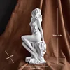 Goddess sitting sideways