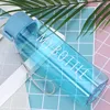 Light blue bottle with round cap