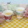 Bicchiere di carta con manico